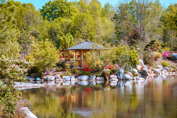 Wall Mural - Landscape shot of a gazebo along the pond in the japanese garden at the Frederik Meijer Gardens in Grand Rapids Michigan