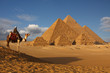 pyramids of giza,cairo,egypt with bedouin on camel in foreground