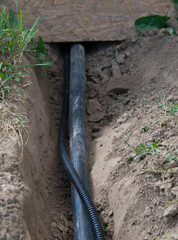 laying of communications, supply of water and electricity to buildings under the ground, an uncovered trench