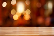 © BrightSpace - Empty wooden table and abstract bokeh blurred color light background, product display ,Ready for product montage, Christmas holiday