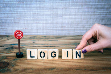 Wall Mural - Stop log in concept. Wooden letters on the office desk, informative and communication background