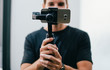 © Rawpixel.com - Man holding a gimbal with a phone