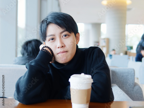 Portrait Of Cute Beautiful Young Lesbian With Short Haircut