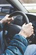 © bearok - Man hands on the steering wheel