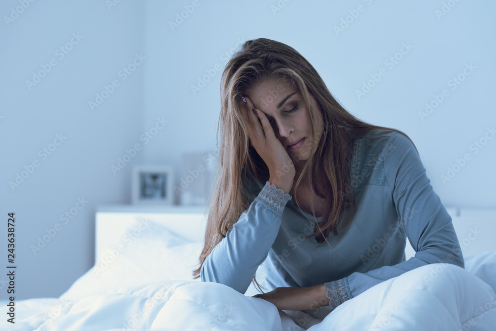 Depressed woman awake in the night - obrazy, fototapety, plakaty 