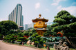 © Westend61 - China, Hong Kong, Diamond Hill, Nan Lian Garden, Golden Pavilion of Absolute Perfection surrounded by skyscrapers