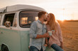 © Westend61 - Young couple kissing during sunset