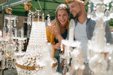 Belgium, Tongeren, Happy Young Couple On An Antique Flea Market