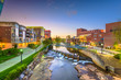 © SeanPavonePhoto - Greenville, South Carolina, USA downtown cityscape on the Reedy River at dusk