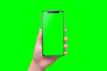 Poster - Modern smart phone in hand close-up. Isolated screen and background in green.