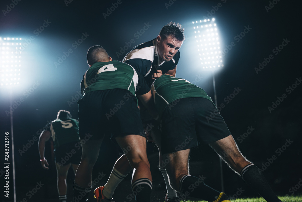 Rugby player tackled opponent team Stock Photo | Adobe Stock