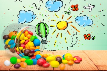 Wall Mural - Colorful candies sweets falling out of a glass jar, composition