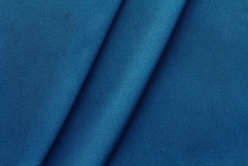 Wall Mural - blue fabric with two large diagonal folds