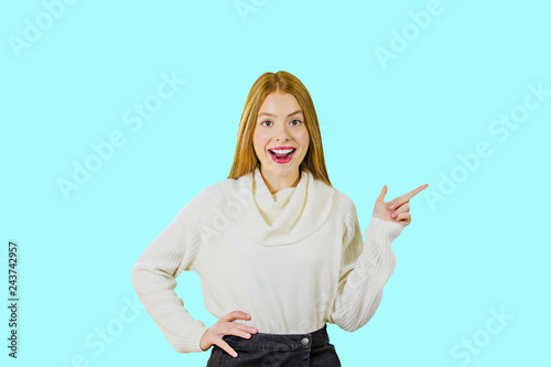 Fotografie, Obraz A portrait of a cute red-haired girl who is looking at the camera smiling with h