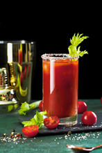 Bloody Mary Cocktail. Alcoholic Drink And Ingredients On Dark Green Background, Copy Space