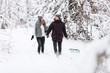 © Aleksandr - Happy young couple in winter park laughing and having fun. Family outdoors