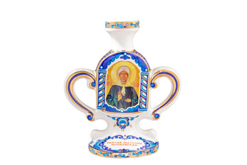 Wall Mural - ceramic souvenir toy in the form of jug with beautiful color painting on isolated white background reflecting the national Russian culture with the inscription in Russian: St. Matrona Of Moscow