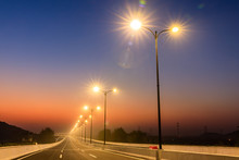 City Road And Bright Street Lights Landscape At Sunset