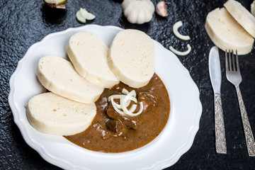 Wall Mural - Beef goulash with dumplings