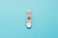 Gray Remote For Tv On Blue Isolated Background. Flat Lay, Top View