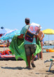 © ChiccoDodiFC - Hawker pedlar on the beach