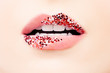 © artmim - Pastel pink color lips with glitter and tint. Matte pink tint and red glossy glitter make-up