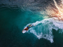 Bodyboard Surfer Rides Tropical Wave At Sunset