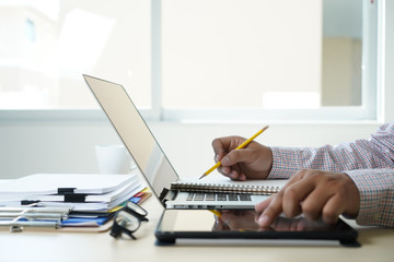 Poster - double exposure of business man hand working on laptop computer on wooden desk with social media network diagram