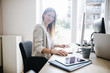 © LStockStudio - Businesswoman Working on a Desktop Computer
