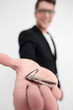 © ASDF - close up.business man holding out keys