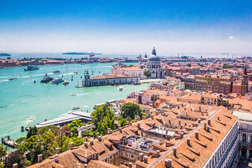 Wall Mural - Panoramic view of Venice - Basilica Santa Maria della Salute, Grand Canal with gondolas and red tiled roofs of houses, Venice, Italy