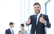Handsome Businessman Showing Thumbs Up