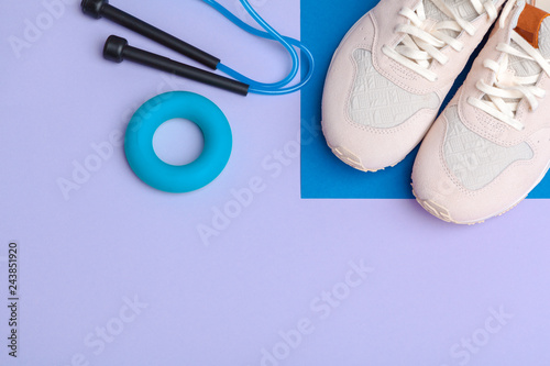 Fotografia Fitness Gym equipment on color background