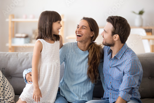 Happy Family Of Three Laughing Talking Playing Little Kid
