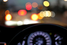 Vehicle Car Steering Wheel And Blur Bokeh Abstract Background