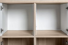 Empty Wardrobe Compartments, Closeup View. Stylish Furniture