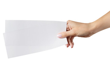 Female hand holding two blank sheets of paper (tickets, flyers, invitations, coupons, banknotes, etc.), isolated on white background