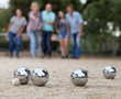 © JackF - Image of people playing petanque on sand