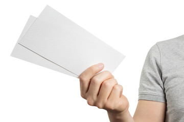 Male hand holding two blank sheets of paper (tickets, flyers, invitations, coupons, money, etc.), isolated on white background