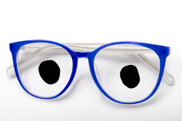 Wall Mural - The blue frame of the glasses in which the eyes are drawn. Isolated