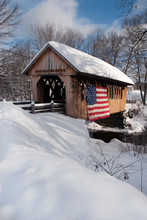 Patriotic Snow Covered Bridge In New England