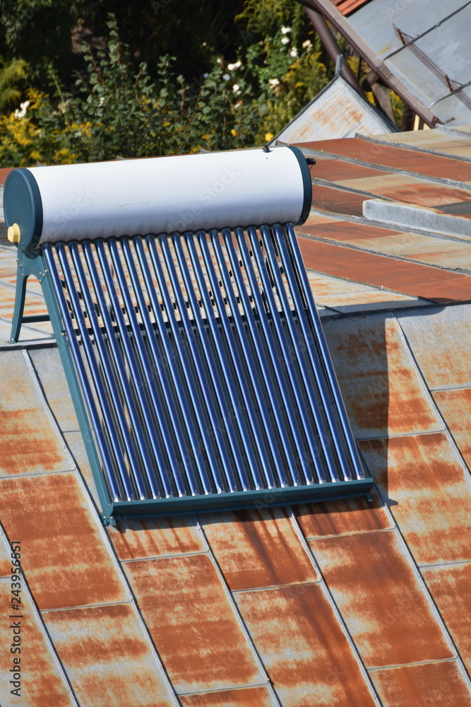 Evacuated tube solar water heater Stock Photo | Adobe Stock