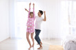 © Africa Studio - Cute young couple dancing indoors