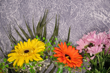 Colorful flowers on grey background.Bouquet of flowers