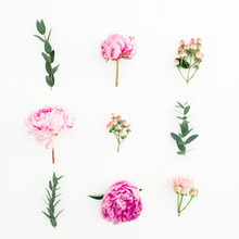 Floral Composition Of Pink Peonies, Roses, Hypericum And Eucalyptus On White Background. Flat Lay, Top View