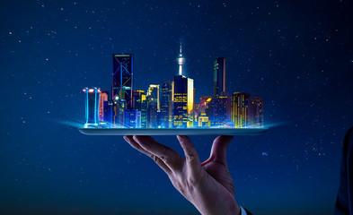 Poster - waiter hand holding an empty digital tablet with smart cityscape .