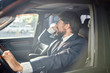 © SHOTPRIME STUDIO - luxury business man talking on the phone sitting in the car