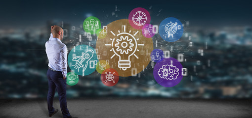 Poster - businessman in front of a cloud of colorfull start up icon bubble with data binary 3d rendering