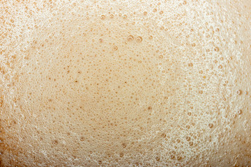 Hot chocolate cocoa drink close up macro foam texture.