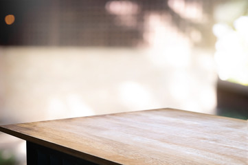 empty wood table with blur montage outdoor garden background